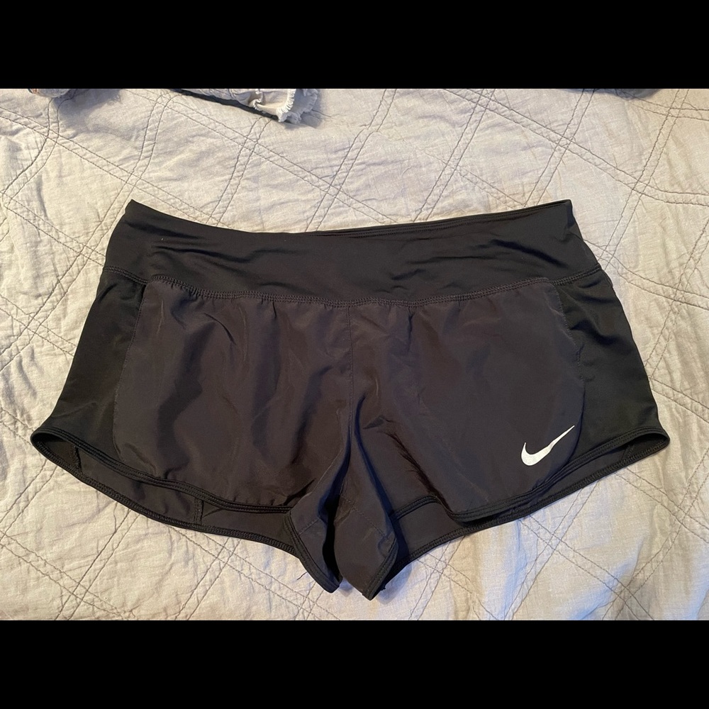 Black Nike running shorts